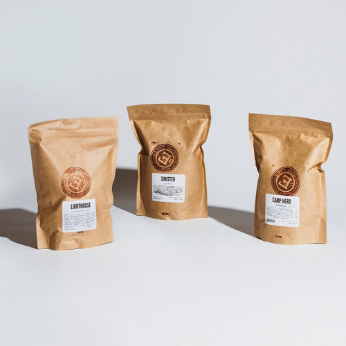 Image of 3 of the 16oz retail craft bags. Each bag has a label of the blend in the front