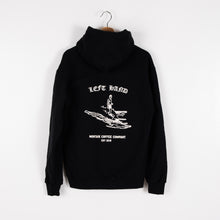 Load image into Gallery viewer, Image of a black Left Hand Coffee hoodie with a surfer on the back
